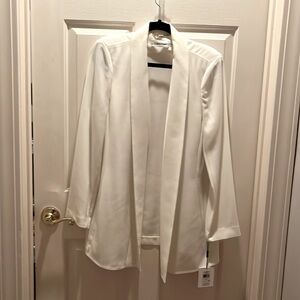Calvin Klein Cream, long open jacket. Unlined, 96% Polyester,4 % spandex.
